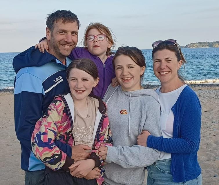 Jason, Sarah and the girls at the beach